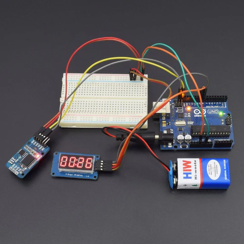 make a digital clock using 4 bit TM1637 Led display module and DS3231 RTC module interfacing with Arduino uno