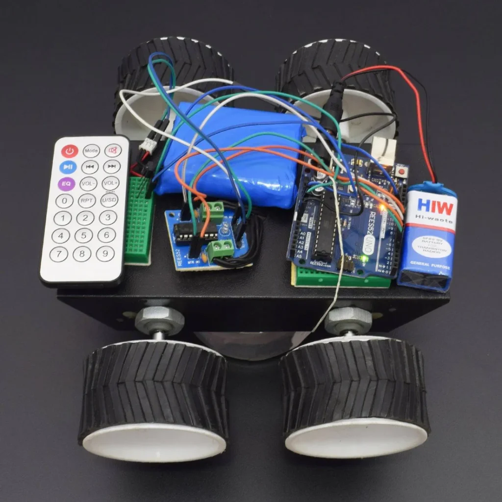 Make a IR control robot car using 7*4 wheel and L293De motor driver interfacing with Arduino uno